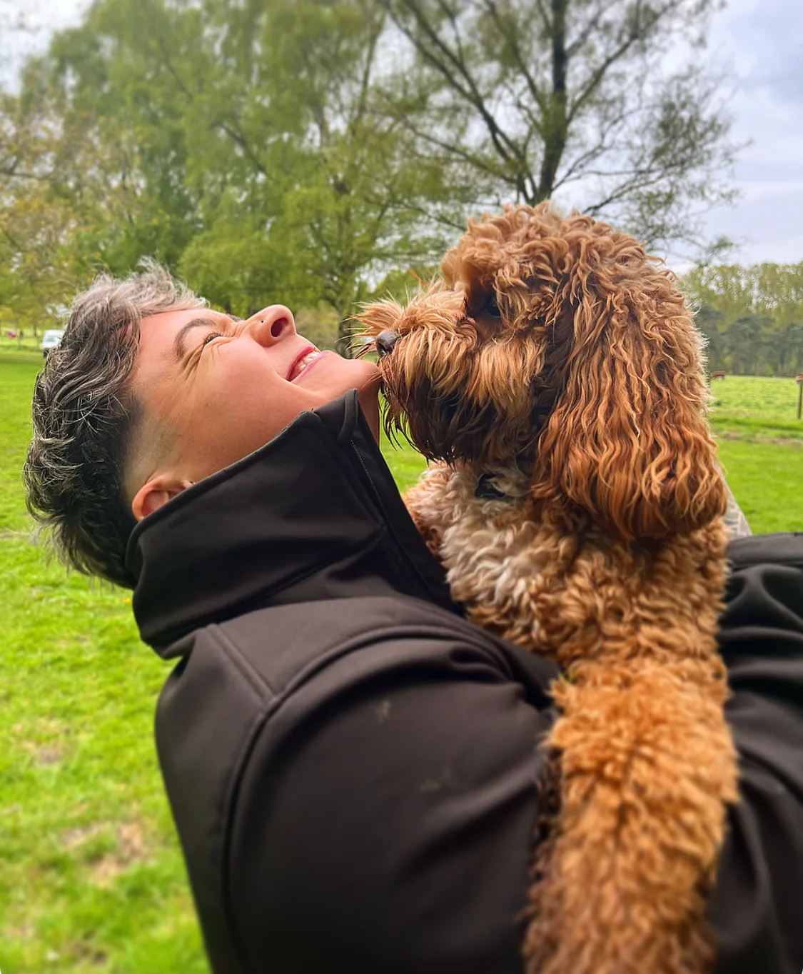 Happy dog cuddle moment